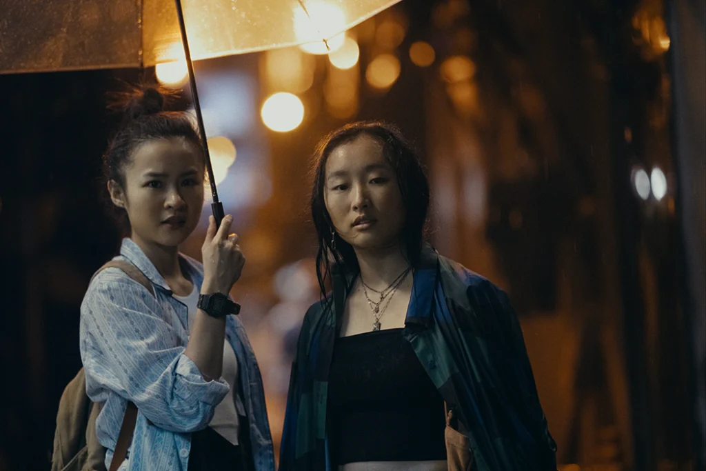 Ji-young Yoo and Bonde Sham in Expats by Lulu Wang. Image courtesy of Prime Video.