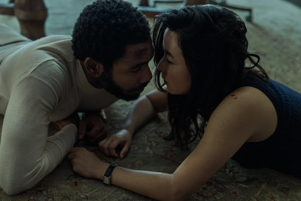 Maya Erskine and Donald Glover as Jane and John Smith in Mr. and Mrs. Smith. Image courtesy of Prime Video.