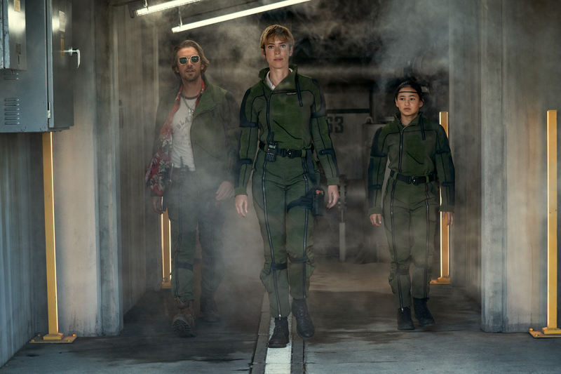 (L-r) DAN STEVENS as Trapper, REBECCA HALL as Dr. Ilene Andrews and KAYLEE HOTTLE as Jia in Warner Bros. Pictures and Legendary Pictures’ action adventure “GODZILLA x KONG: THE NEW EMPIRE,” a Warner Bros. Pictures release.