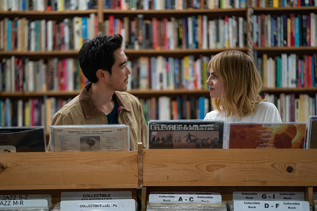 Justin Min and Lucy Boynton in The Greatest Hits