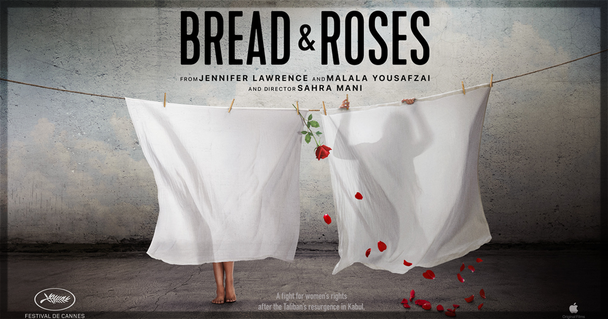 This is a banner for a review of the documentary Bread & Roses.
