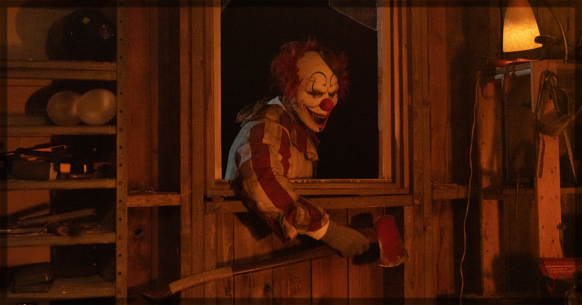 This is a banner for a review of the horror film Clown in a Cornfield.