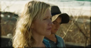 This banner is for a review of the movie Karavan.