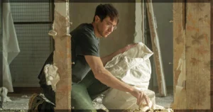 This is a banner for the film À pied d’œuvre, At Work. Image courtesy of the filmmakers.