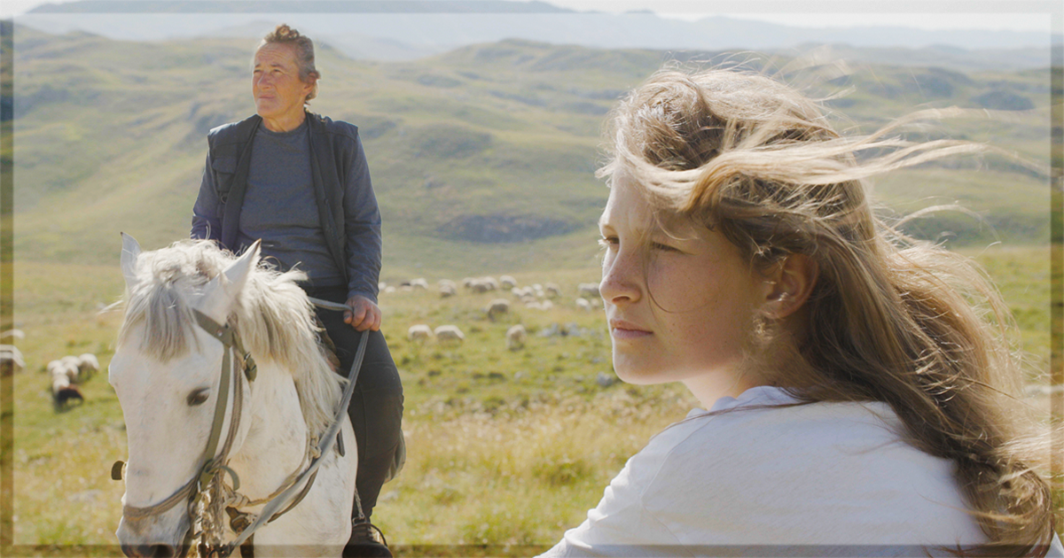 This is a banner for a review of the documentary To Hold a Mountain. Image courtesy of the filmmakers.