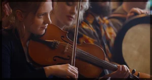 This is a banner for a review of the film Trad. Image courtesy of the filmmakers.