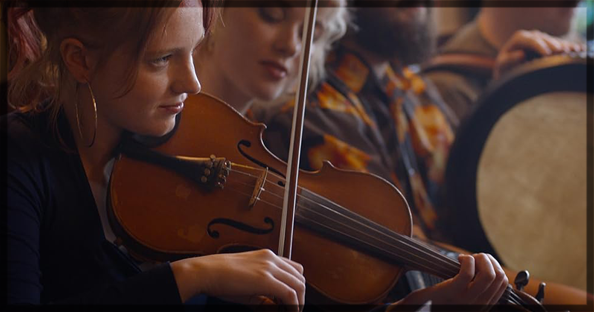 This is a banner for a review of the film Trad. Image courtesy of the filmmakers.